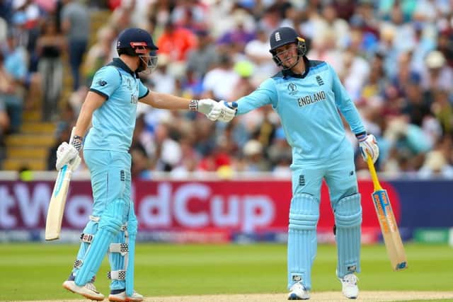 OPENING SALVO: England's Jonny Bairstow (left) and England's Jason Roy celebrate their 100-run partership against Australia at Edgbaston. Picture: Nigel French/PA.