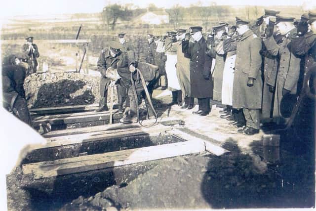 The funeral of POWs who died of Spanish flu taking place at Morton cemetery, Keighley, in March 1919 when Sachsse was Senior German Officer. Sachsse can be seen in the dark coat (Reproduced with permission of Bradford Libraries)