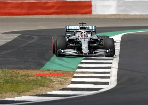 Mercedes driver Lewis Hamilton in action during 2nd practice for the British Grand Prix at  Silverstone.