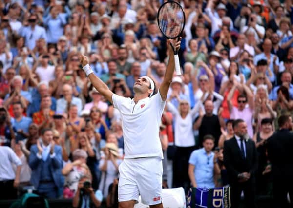 Roger Federer celebrates victory in his Wimbledon semi-final against Rafael Nadal. Picture: Adam Davy/PA