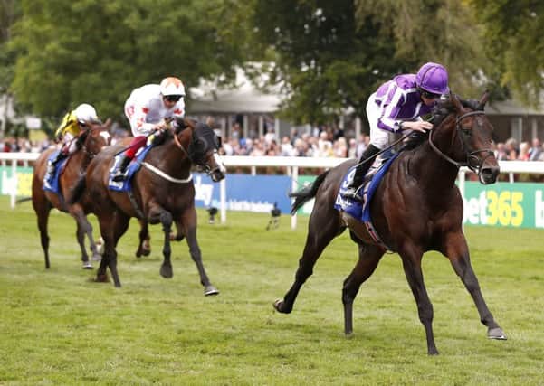 Ten Sovereigns ridden by jockey Ryan Moore on their way to victory in the Darley July Cup Stakes at Newmarket Racecourse. (Picture: Darren Staples/PA Wire)