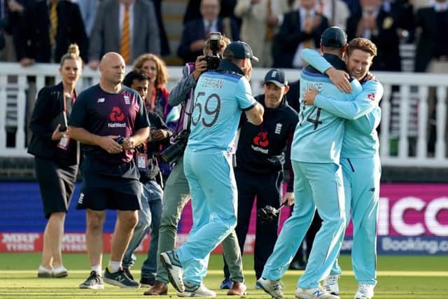 England players celebrate on the pitch after winning the ICC World Cup Final at Lord's, London. PRESS ASSOCIATION Photo. Picture date: Sunday July 14, 2019. See PA story CRICKET England. Photo credit should read: John Walton/PA Wire. RESTRICTIONS: Editorial use only. No commercial use. Still image use only.