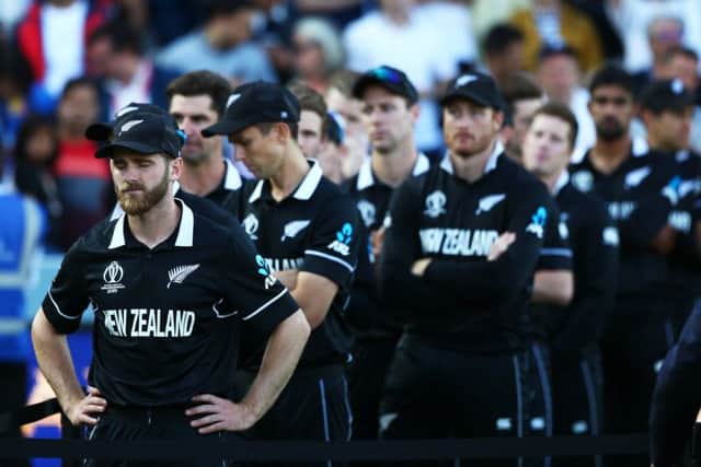 EDGED OUT: New Zealand captain Kane Williamson, far left, and his players show their understandable disappointment after losing out to England in the World Cup Final at Lord's. Picture: Michael Steele/Getty Images