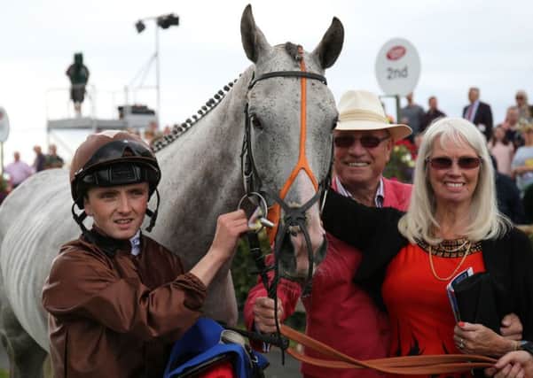 Owners Chris and Joan Brown, with jockey Chris Hayes, after Dream Walker won at Galway in 2016.