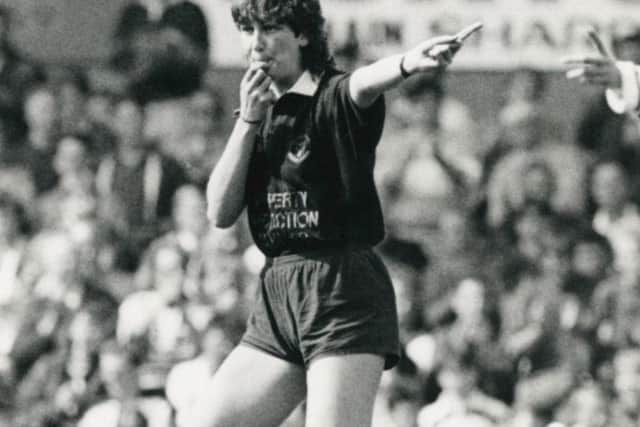 Julia Lee refereeing in 1986. Photo sent by Crossing the Line project, courtesy of Andrew Varley Agency.
