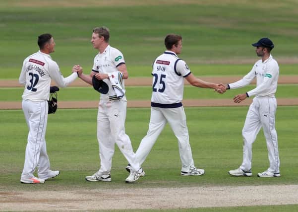 Yorkshire captain Steven Patterson, second left, celebrates at the end of the match with his players. Picture: Paul Currie/SWpix.com