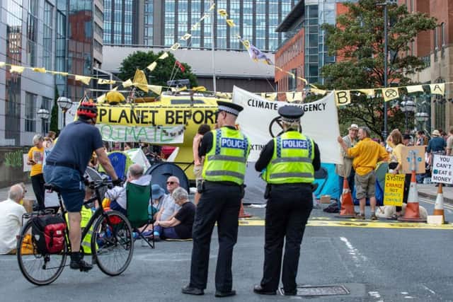 Members of Extinction Rebellion protest on the streets
