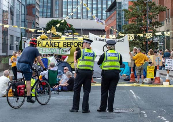 Members of Extinction Rebellion protest on the streets