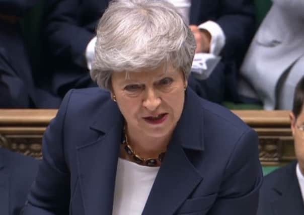 Theresa May was pressed about transport investment at PMQs.