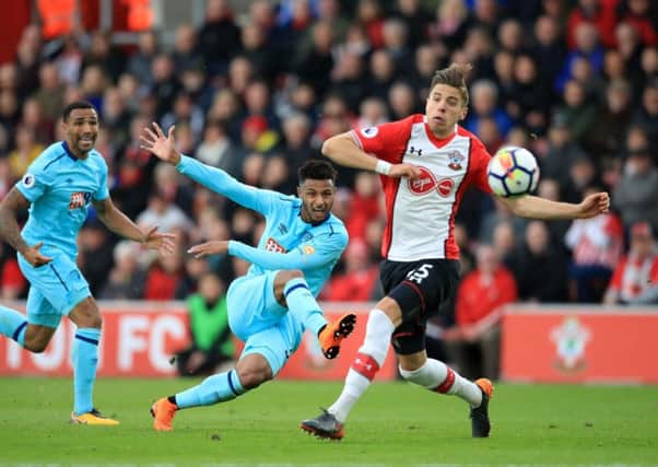 AFC Bournemouth's Lys Mousset (centre) has a shot on goal against south coast rivals Southampton. Picture: Adam Davy/PA