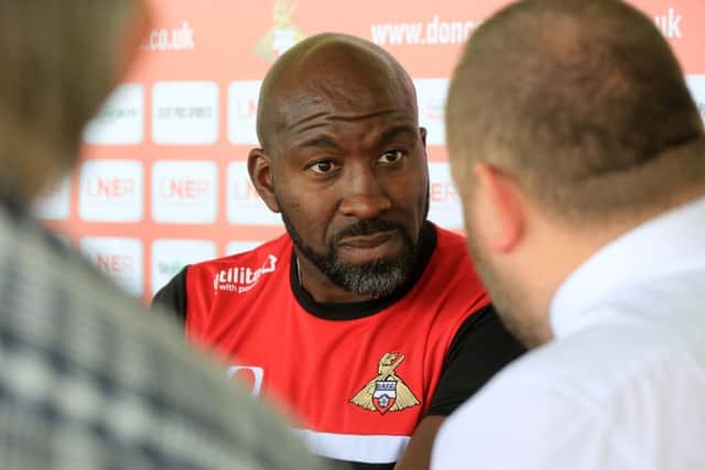HELPING HAND: Doncaster Rovers' manager Darren Moore. Picture: Chris Etchells.