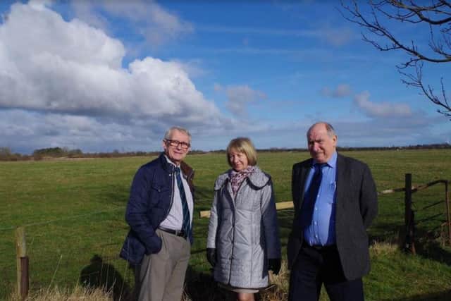 Councillors John Dennis, Sue Steel and Mike Bryan at the site