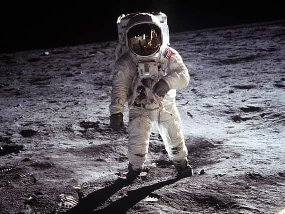 Buzz Aldrin, the lunar module pilot, walking on the surface of the Moon near the leg of the Lunar Module. Credit: NASA/PA.