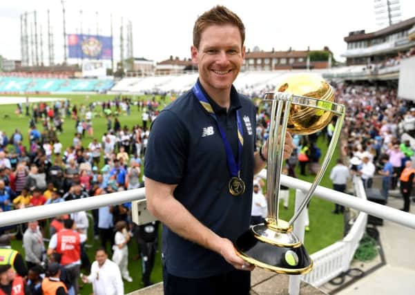 England captain Eoin Morgan parades the World Cup trophy surrounded by fans during the England ICC World Cup Victory Celebration at The Kia Oval on July 15, 2019 in London, England. (Picture: Gareth Copley/Getty Images)