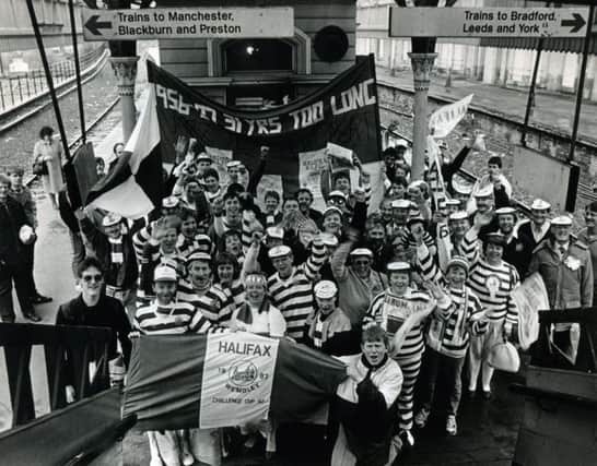 Here we go, here we go: Halifax fans set off from the railway station to go to Wembley in 1987 for the Challenge Cup final.