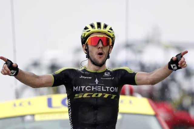 CATCH ME IF YOU CAN: Simon Yates celebrates as he crosses the finish line to win the 15th stage of the Tour de France with start in Limoux and finish on Sunday. Picture: AP/Christophe Ena)