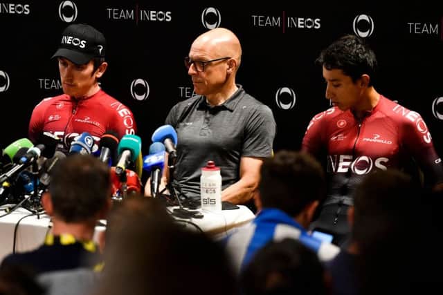 Great Britain's Geraint Thomas (L) attends a press conference in Nimes, with team principal Dave Bralisford, centre. Picture: Gerard Julien/AFP/Getty Images