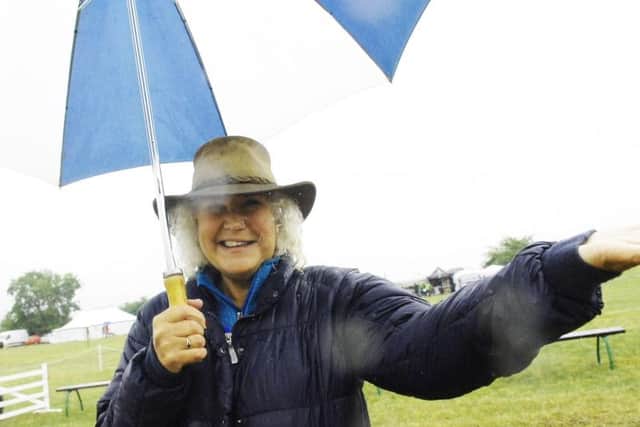 Paula Ware, who chairs Weeton Show, at last summer's event which was hit by downpours. Picture by Adrian Murray.