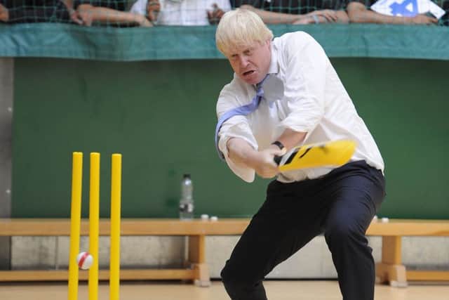 Boris Johnson taking part in a street cricket tournament in aid of Chance to Shine Street charity at Hillingdon Sports and Leisure Complex in London in 2017. (PA).