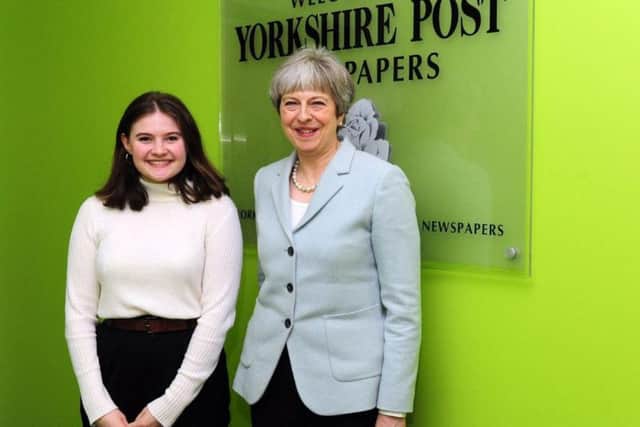 Theresa May poses with one of The Yorkshire Post's apprentices, Natasha Meek