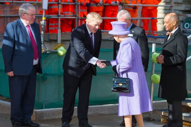 Boris Johnson greets the Queen at Crossrail's troubled Bond Street station in 2016.