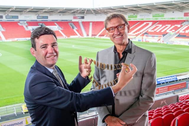 OVER TO YOU: Andy Burnham hands the presidential chains of the RFL over to Tony Adams. Picture: Allan McKenzie/SWpix.com