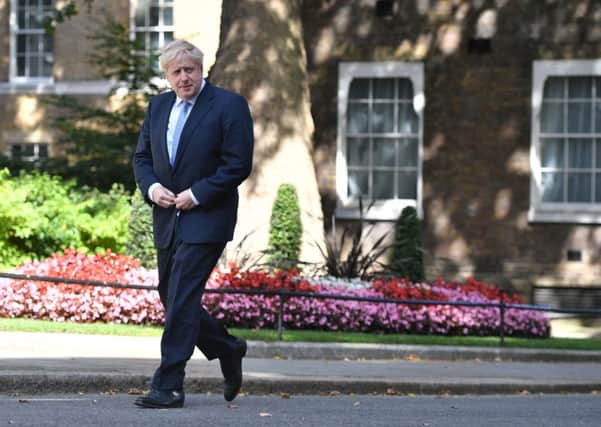 New Prime Minister Boris Johnson arrives in 10 Downing Street.