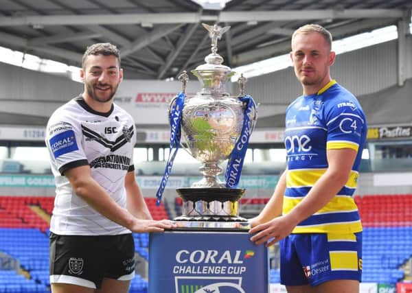 Cup foes: Hull's 
Jake Connor and Warrington's Ben Currie.