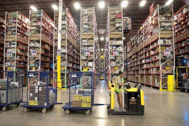 On the move: The full warehouses seen in March did empty out a little after a new Brexit deadline for leaving the EU was set for October 31. PHOTO: Getty Images