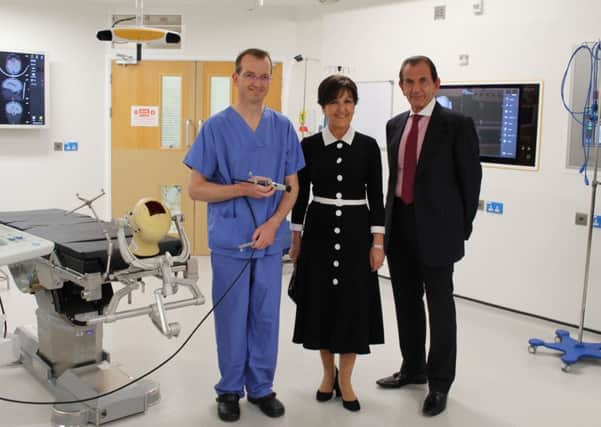 Yorkshire lawyers Marliyn and Grahame Stowe with paediatric surgeon John Goodden.