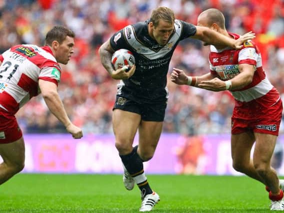 Hull FC's Joe Westerman breaks past Wigan's Scott Taylor and Lee Mossop in the 2013 Challenge Cup final at Wembley. (PIC: ALEX WHITEHEAD/SWPIX.COM)