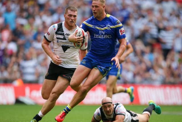 Joe Westerman in action for Warrington as he leaves former Hull team-mates Scott Taylor and Danny Houghton in his wake during the 2016 Challenge Cup final. (PIC: Alex Whitehead/SWpix.com)