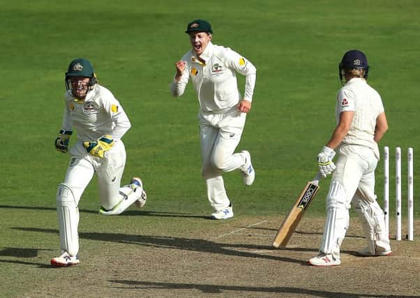 Outplayed: Australia wicketkeeper Alyssa Healy celebrates after England's Katherine Brunt is bowled by Ashleigh Gardner during day three of the Women's Ashes Test.