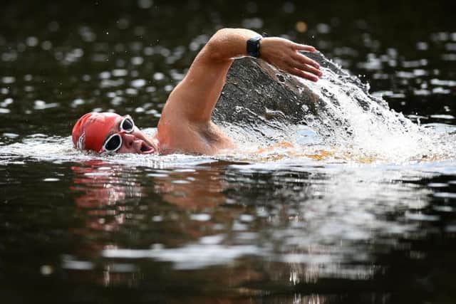 Andrew Ainge, swimming the Channel for The Brain Tumour Charity, pictured at the River Wharfe at Otley this week.