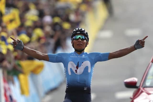 Colombia's Nairo Quintana celebrates as he crosses the finish line to win the eighteenth stage in Valloire. Picture: AP/ Thibault Camus