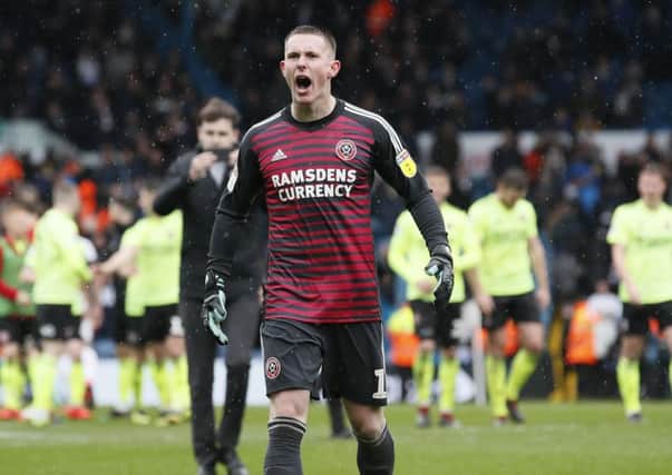 Dean Henderson, pictured celebrating Sheffield United's key win against Leeds in March, is heading back to Bramall Lane. (Picture: Simon Bellis/Sportimage)