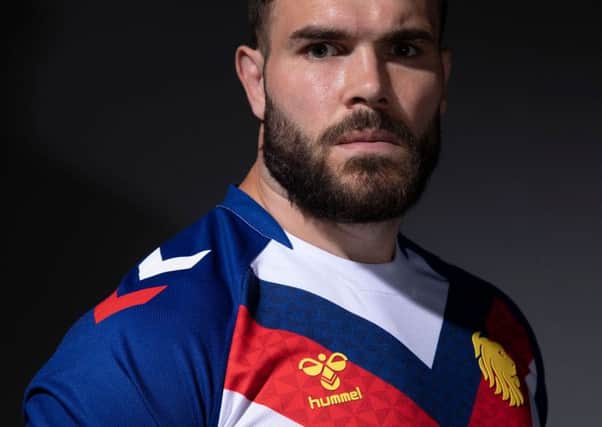 Kitted out: Alex Walmsley in the GB shirt.