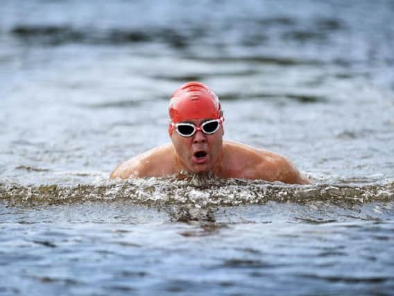 Menston's Andrew Ainge is to attemp to swim the English Channel, raising money for The Brain Tumour Charity after his ex-wife and mother were diagnosed.