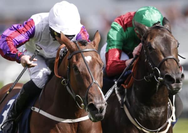 Karl Burke's Laurens (left), pictured winning at Doncaster under PJ McDonald, will chase Group One honours in France this weekend.