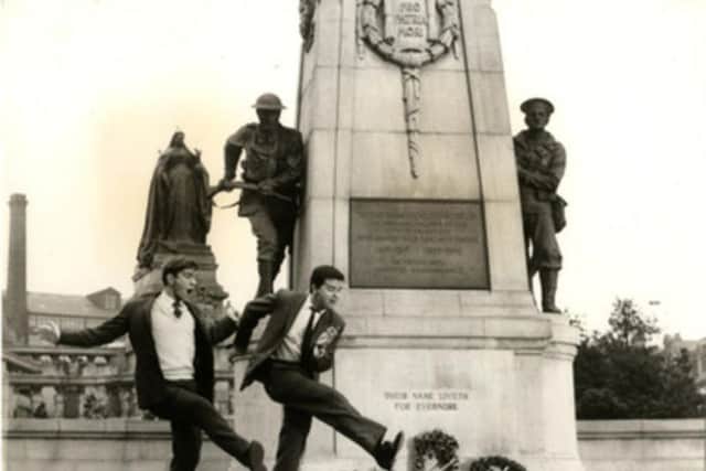 Tom Courtenay (left) and Rodney Bewes dance on the steps of Bradford's War Memorial in the 1963 film, Billy Liar
