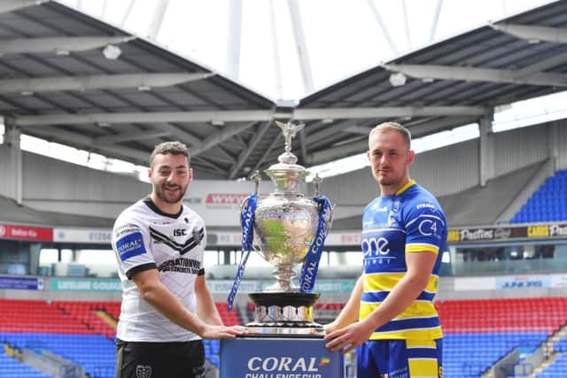 Hull's Jake Connor and Warrington's Ben Currie