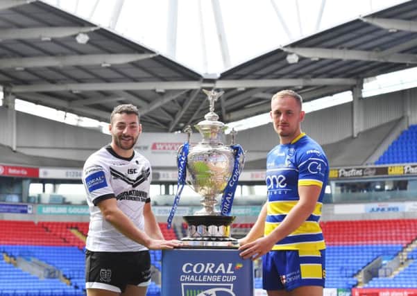 Hull's Jake Connor and Warrington's Ben Currie
