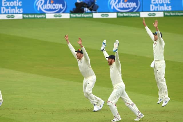 GOT HIM: England wicketkeeper Jonny Bairstow (c) Joe Root (r) Moeen Ali and Jason Roy celebrate after Stuart Broad dismisses Kevin O' Brien Ireland at Lord's. Picture: Stu Forster/Getty Images