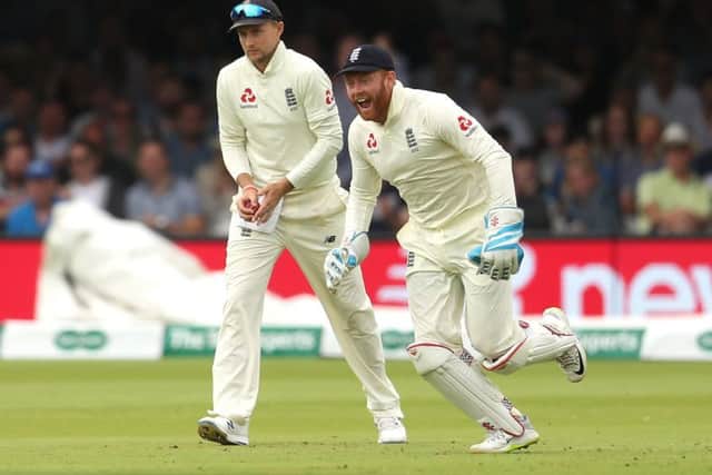KEY MAN: England's Jonny Bairstow (right) celebrates the catch of Ireland's Andrew Balbirnie by England's Joe Root at Lord's. Picture: Bradley Collyer/PA
