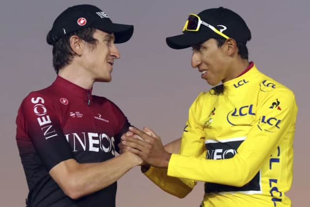 Colombia's Egan Bernal, the winner, right, shakes hands with Britain's Geraint Thomas, who placed second. Picture: AP/Thibault Camus