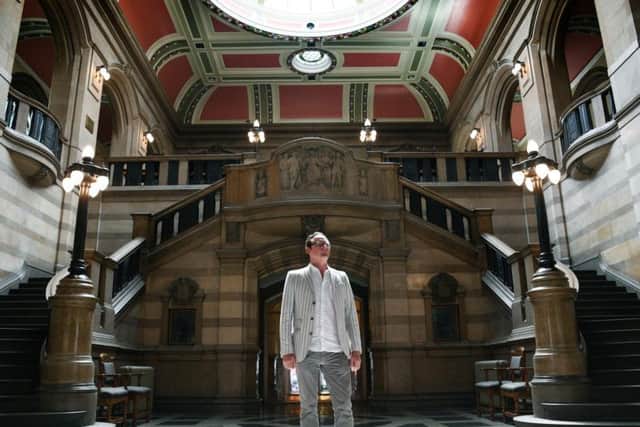 David Wilson in Bradford City Hall's main entrance. Picture by Jonathan Gawthorpe.