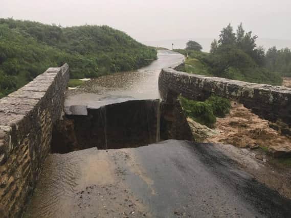 Heavy flooding on roads in Yorkshire causes severe damage to bridges. Photo Swaledale Mountain Rescue Team.