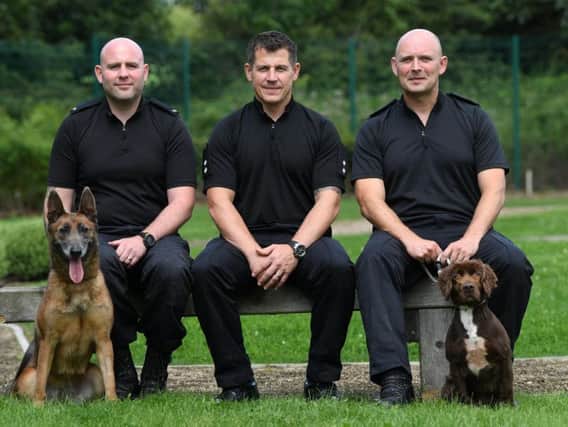 Police dogs Resi and Max with PC Dave Lowry, Inspector Shane Cartwright and Sergeant Stewart Dunderdale,