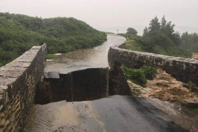 Grinton Bridge collapsed due to the flooding. Photo by Swaledale Mountain Rescue Team.