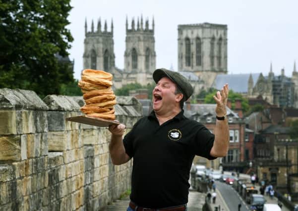 Wayne Chadwick from The York Roast Co gets ready for Yorkshire Day in the shadow of York Minster. Picture Jonathan Gawthorpe